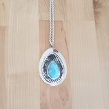 Front view of larimar and sterling silver pendant necklace from Capulin Creations