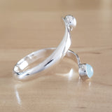 Side View of Aquamarine and Sterling Silver Adjustable Ring with One Stone and One Granule