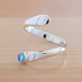 Side view of the Blue Topaz and Sterling Silver Adjustable Ring with One Stone
