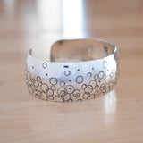Side View of the Cuff Bracelet in Sterling Silver from the Bubbles Collection