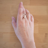 Hand of woman wearing the Carnelian and Sterling Silver Adjustable Ring with Two Stones