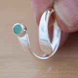 Hand of Woman Holding Chrysoprase and Sterling Silver Adjustable Ring with One Stone