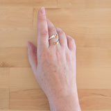 Hand of woman wearing the Citrine and Sterling Silver Adjustable Ring with Two Stones