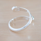 Back View of the Emerald and Sterling Silver Adjustable Ring with Two Stones