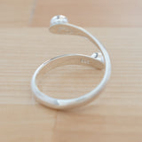 Back view of the Garnet and Sterling Silver Adjustable Ring with One Stone and One Granule