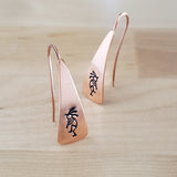 Front Views of Triangle-Shaped Dangle Earrings in Copper Stamped with Kokopelli