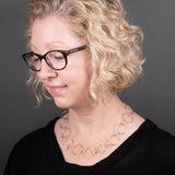 Woman Wearing Chain Necklace in Sterling Silver with Large Round and Small Oval Links