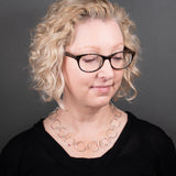 Woman Wearing Chain Necklace in Sterling Silver with Large and Small Round Links