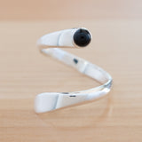 Front view of the Onyx and Sterling Silver Adjustable Ring with One Stone