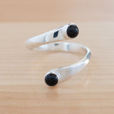 Front view of the Onyx and Sterling Silver Adjustable Ring with Two Stones