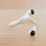 Side view of the Onyx and Sterling Silver Adjustable Ring with Two Stones