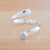 Front view of the Opal and Sterling Silver Adjustable Ring with One Stone