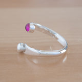 Side view of the Ruby and Sterling Silver Adjustable Ring with One Stone and One Granule
