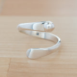 Front view of the Sterling Silver Adjustable Ring with One Granule