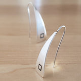 Front views of Triangle-Shaped Dangle Earrings in Sterling Silver stamped with squares