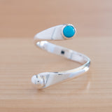 Front view of the Turquoise and Sterling Silver Adjustable Ring with One Stone and One Granule