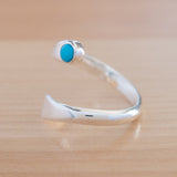 Side view of the Turquoise and Sterling Silver Adjustable Ring with One Stone