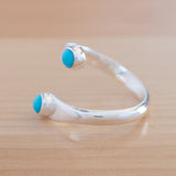 Side view of the Turquoise and Sterling Silver Adjustable Ring with Two Stones