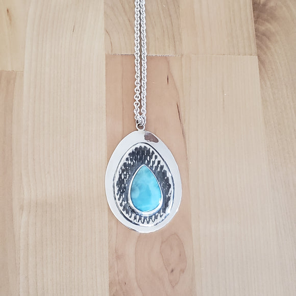 Front view of larimar and sterling silver pendant necklace from Capulin Creations
