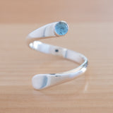 Front view of the Blue Topaz and Sterling Silver Adjustable Ring with One Stone