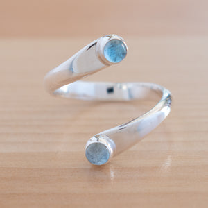 Front view of the Blue Topaz and Sterling Silver Adjustable Ring with Two Stones