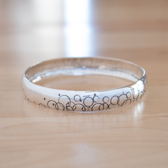 Front View of the Bangle Bracelet in Sterling Silver from the Bubbles Collection