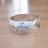 Side View of the Cuff Bracelet in Sterling Silver from the Bubbles Collection
