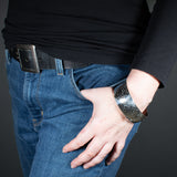 Woman Wearing the Cuff Bracelet in Sterling Silver from the Bubbles Collection
