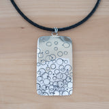 Front View of the Large Pendant Necklace in Sterling Silver from the Bubbles Collection