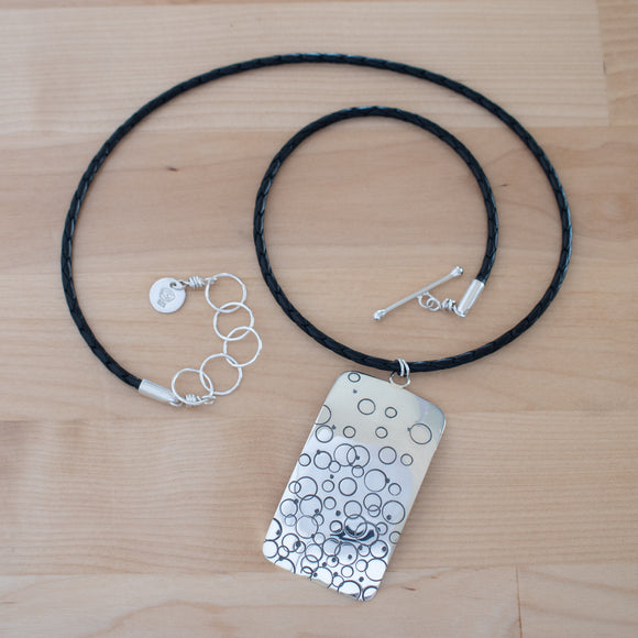 Full View of the Large Pendant Necklace in Sterling Silver from the Bubbles Collection