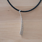 Side View of the Large Pendant Necklace in Sterling Silver from the Bubbles Collection