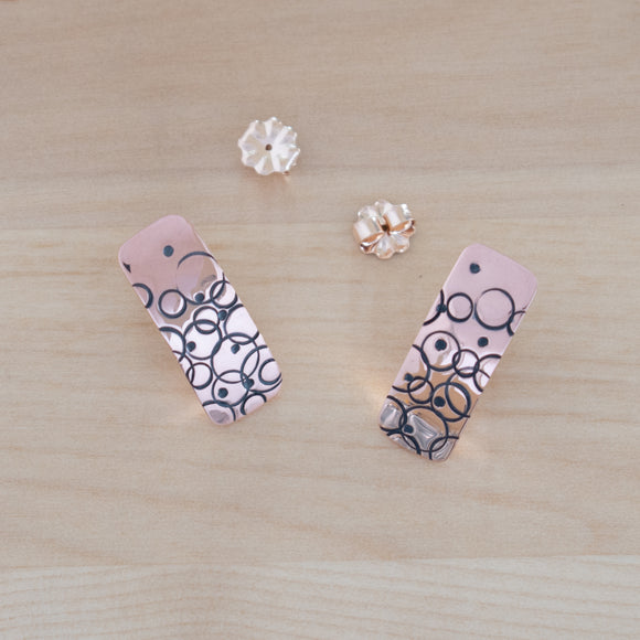 Front View of the Post Earrings in Copper from the Bubbles Collection