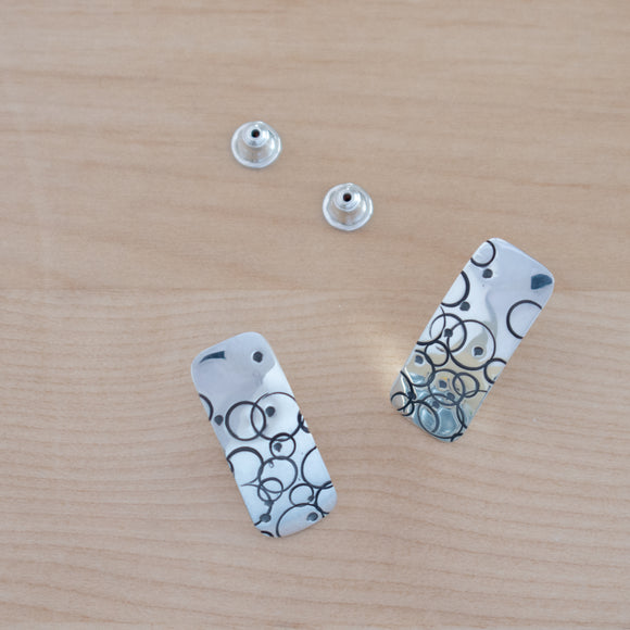 Front View of the Post Earrings in Sterling Silver from the Bubbles Collection