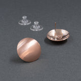Front and back view of copper button earrings in a satin finish from Capulin Creations