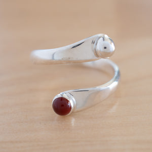 Front view of the Carnelian and Sterling Silver Adjustable Ring with One Stone and One Granule