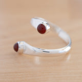 Side view of the Carnelian and Sterling Silver Adjustable Ring with Two Stones