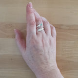 Hand of Woman Wearing Chrysoprase and Sterling Silver Adjustable Ring with One Stone