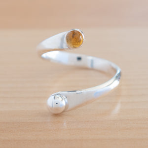 Front view of the Citrine and Sterling Silver Adjustable Ring with One Stone and One Granule