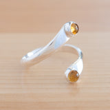 Side view of the Citrine and Sterling Silver Adjustable Ring with Two Stones
