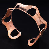 Side view of hammered copper cuff bracelet with ovals from Capulin Creations