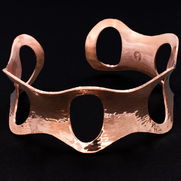 Front view of hammered copper cuff bracelet with ovals from Capulin Creations