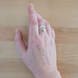 Hand Wearing the Emerald and Sterling Silver Adjustable Ring with One Stone