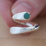 Hand Holding the Emerald and Sterling Silver Adjustable Ring with One Stone