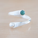 Front View of the Emerald and Sterling Silver Adjustable Ring with One Stone and One Granule