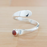 Side view of the Garnet and Sterling Silver Adjustable Ring with One Stone