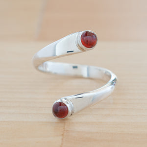 Front view of the Garnet and Sterling Silver Adjustable Ring with Two Stones