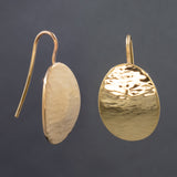 Front and side views of hammered dangle earrings in copper