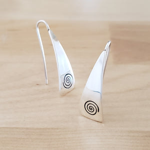 Front Views of Triangle-Shaped Dangle Earrings in Sterling Silver Stamped with Large Spirals