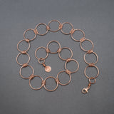 Stylized View of Chain Necklace in Copper with Large and Tiny Round Links