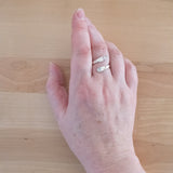 Woman's hand wearing the Moonstone and Sterling Silver Adjustable Ring with Two Stones